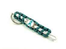 Load image into Gallery viewer, Teal Ribbon Sexual Assault Anxiety MST OCD Ovarian cancer Panic disorder PTSD Tourettes Awareness Paracord Bracelet, Keychain or Necklace